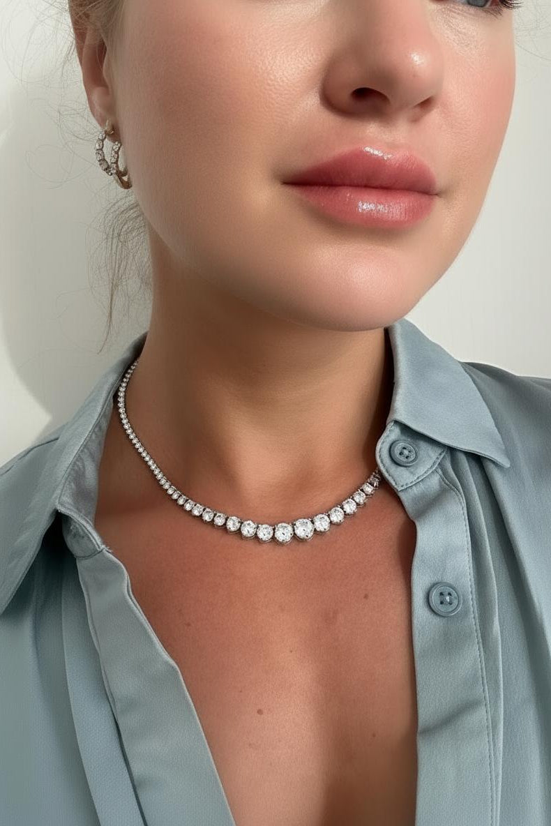 Model with gradual tennis diamond necklace